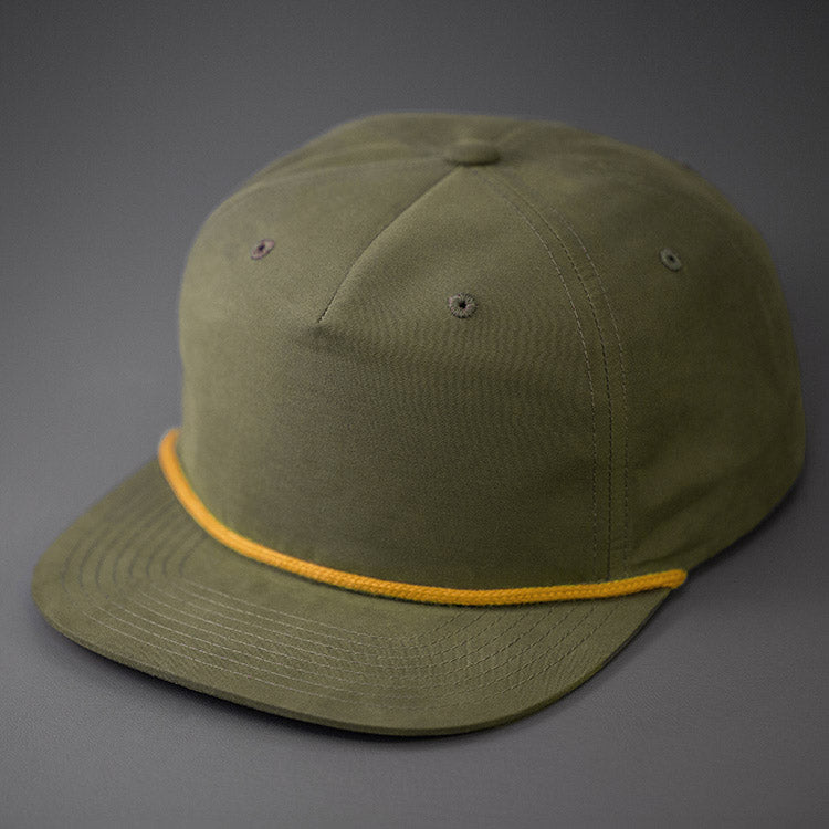A Loden Color, Grandpa Style Nylon, Pinch Front, Blank Flat Bill with a Gold Rope & Classic Snapback. Designed by Blvnk Headwear.