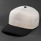 The Blvnk Headwear Vision Vintage Shape Blank Snapback in the Natural and Black Suede color way.