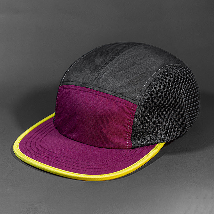 The Ultra Tech blank performance 5 Panel Runners Cap in Berry Black and Lion Yellow by Blvnk Headwear.