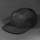 The Ultra Tech blank performance 5 Panel Runners Cap in Black by Blvnk Headwear.
