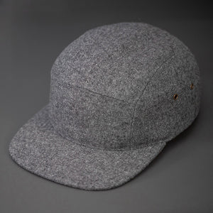 A Warm, Heather Grey, Melton Wool, Blank 5 Panel Camp Hat With a Flat Bill, & Leather Strapback. - Designed by Blvnk Headwear.