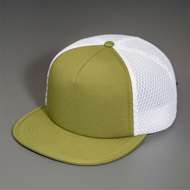 A Water Resistant Nylon, Blank Trucker Hat with a Packable Flotation Bill with a Hydro Mesh back & Woven Nylon Strapback. | Olive & White Colorway by BLVNK Headwear.