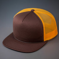 A Brown & Gold, Foam Front, Mesh Backed Blank Trucker Hat with a Flat Bill, & Classic Snapback.  Designed by Blvnk Headwear.
