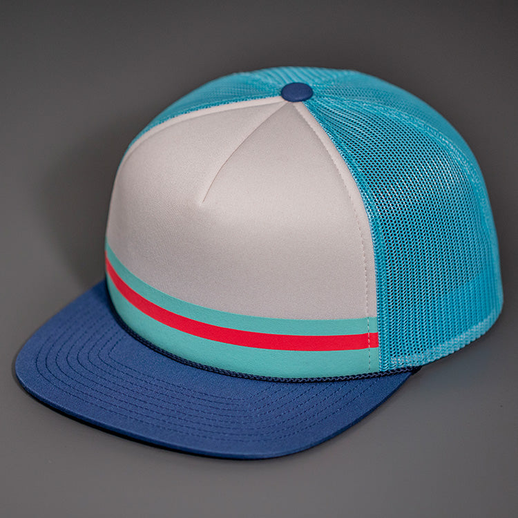The "Line Up" Grey, Sea Foam & Coral Printed Foam Front, Sea Foam Mesh Backed, Blank Trucker Hats with a Black Flat Bill, & Classic Snapback. Designed By Blvnk Headwear.