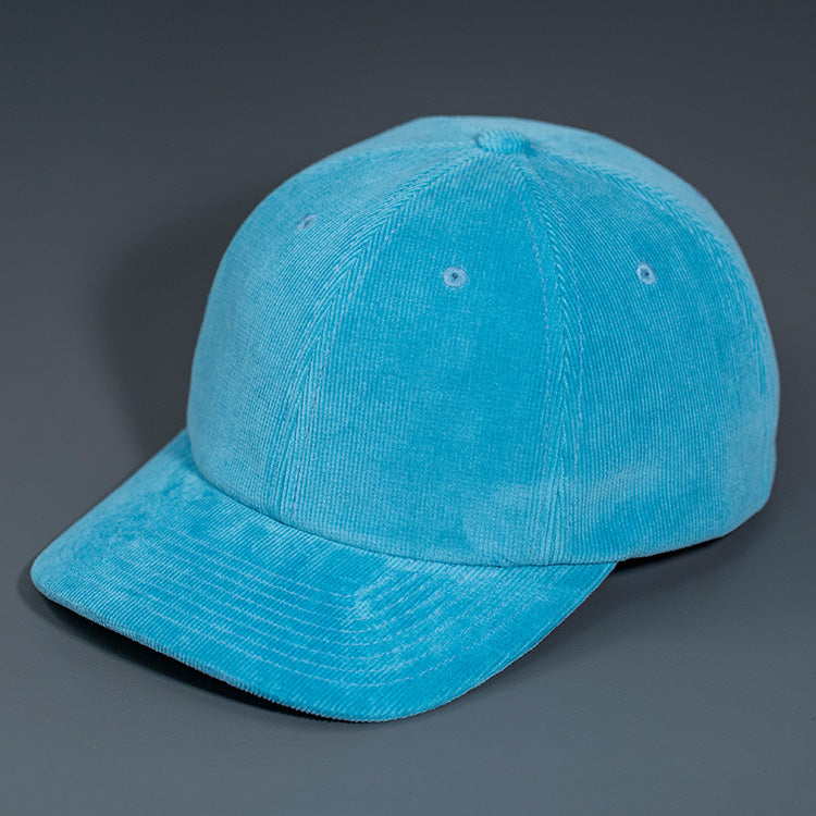 A Sky Blue Corduroy, 6 Panel Crown, Blank Dad Hat with a matching fabric Back Strap & Brass Clasp.  Designed by Blvnk Headwear.
