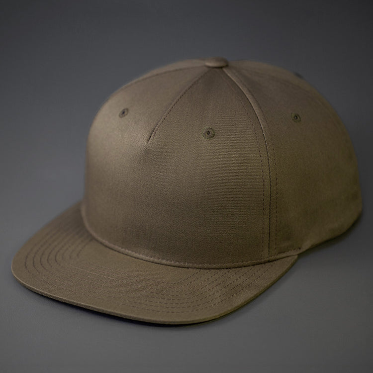 A Dark Loden Colored, Cotton Twill, Pinch Front, Blank Snapback Hat. Designed & Manufactured by Blvnk Headwear.
