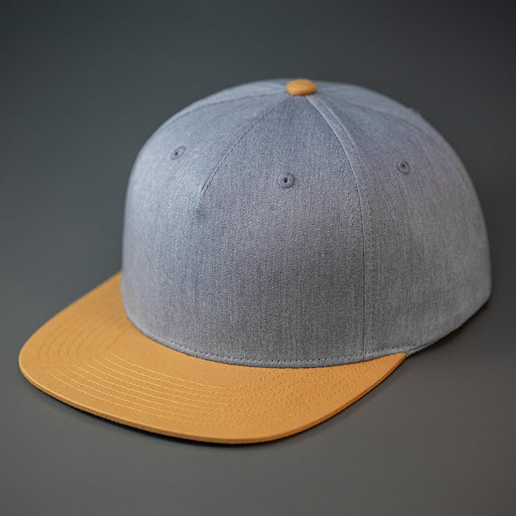 A Heather Grey & Biscuit Colored, Cotton Twill, Pinch Front, Blank Snapback Hat. Designed & Manufactured by Blvnk Headwear.
