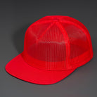 A Red, Full Mesh, Flat Bill Blank Trucker Hat W/ Classic Snapback