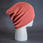 A Coral Pink colored, super slouch knit blank beanie. Designed by Blvnk Headwear.