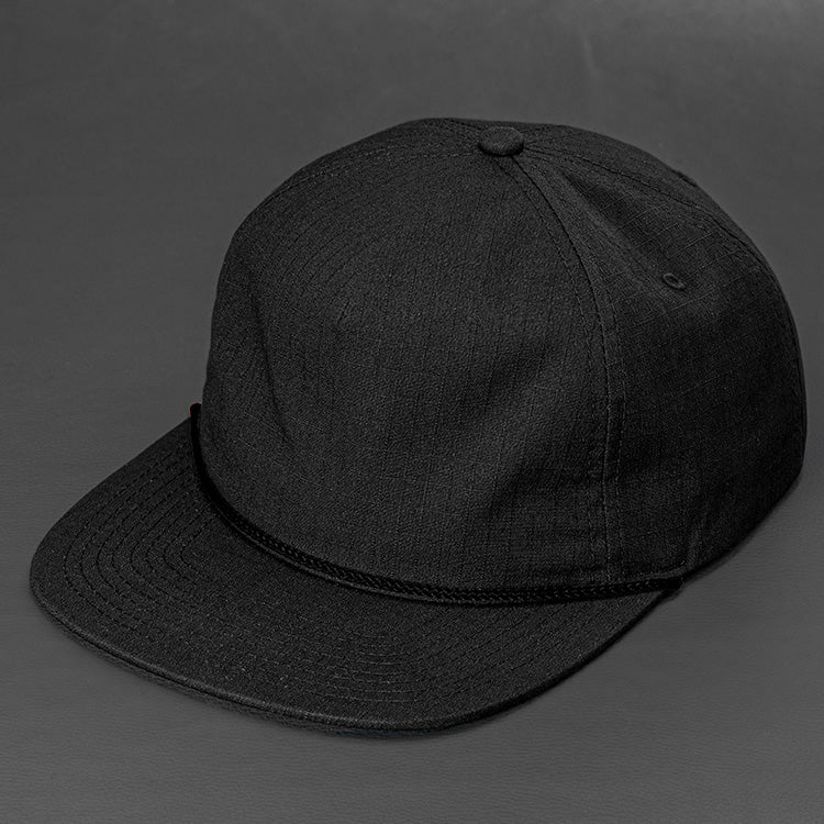 The Ranger unstructured rip stop pinch front blank 5 panel hat in black with a black rope by Blvnk Headwear.