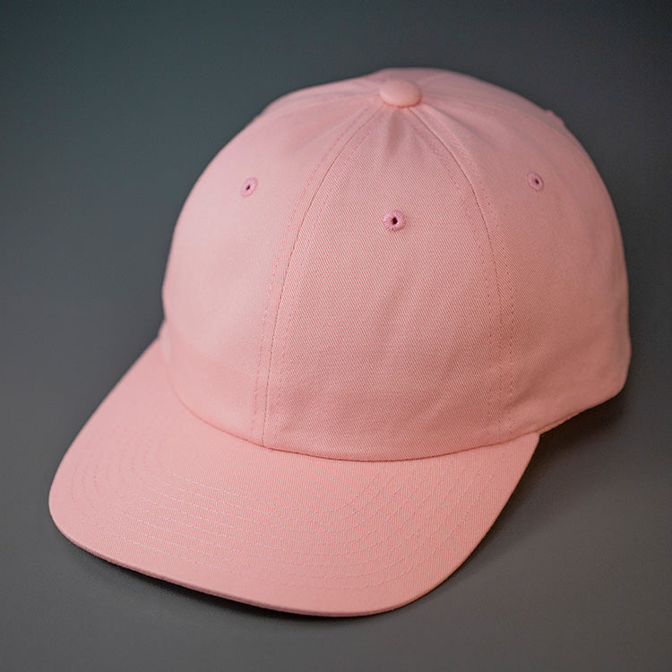 A Light Pink, Premium Cotton, 6 Panel Crown, Blank Dad Hat.  Designed by Blvnk Headwear.