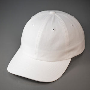 A White, Premium Cotton, 6 Panel Crown, Blank Dad Hat.  Designed by Blvnk Headwear.