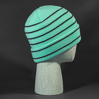 The Brussels Blank Waffle Beanie in Seafoam and Black by Blvnk Headwear.