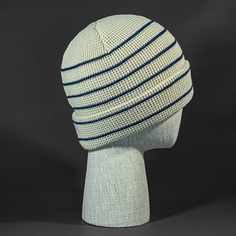 The Brussels Blank Waffle Beanie in Stone and Pale Navy by Blvnk Headwear.