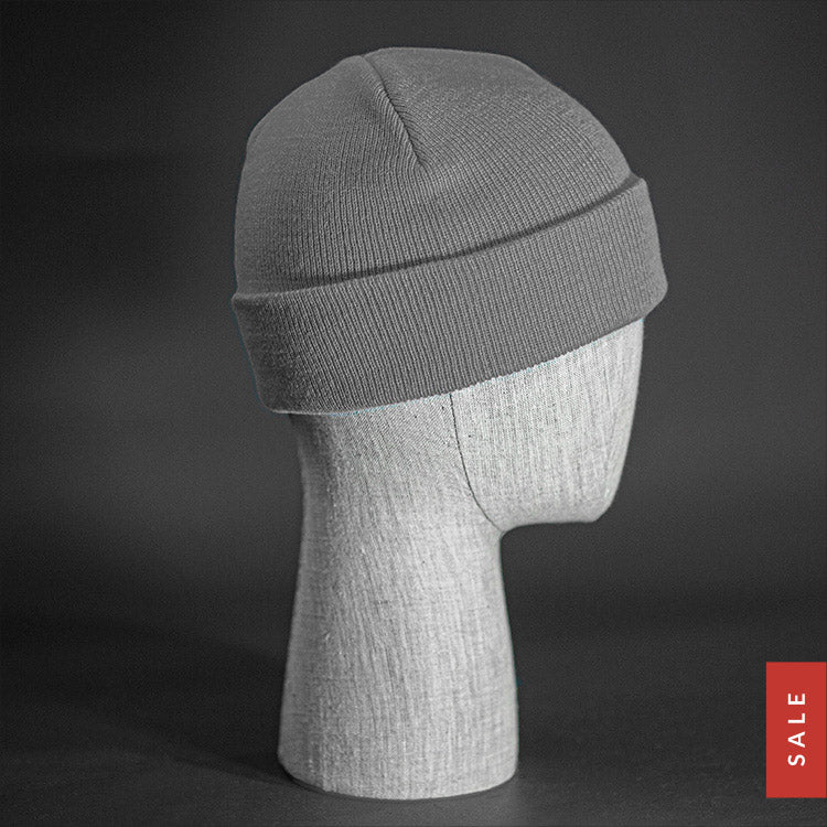 The Longshore Beanie, a grey colored, tight knit, short length blank beanie. Designed by Blvnk Headwear.