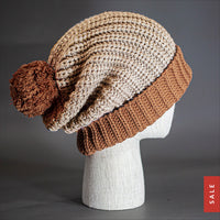 Blvnk Sundance Beanie in Cream and Mocha is an extra long super slouchy cuffed blank beanie with a chunky knit and oversized pom pom. Now on Sale at blvnkheadwear.com