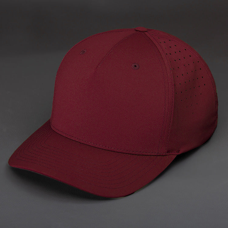 The Vanguard blank performance Snapback hat in Syrah by Blvnk Headwear.