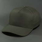 The Blvnk Headwear Origin Vintage Shape Blank Snapback Hat in the Dirty Olive color way.