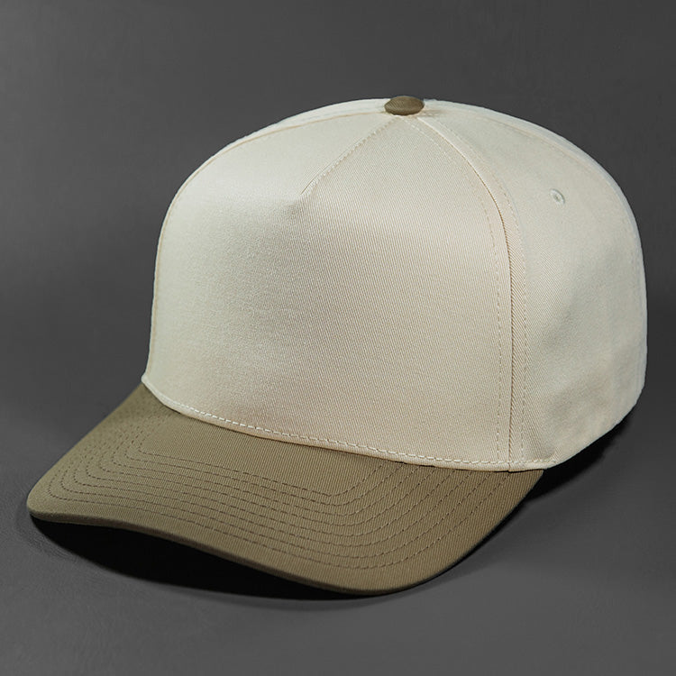 The Blvnk Headwear Origin Vintage Shape Blank Snapback Hat in the Natural and Khaki color way.