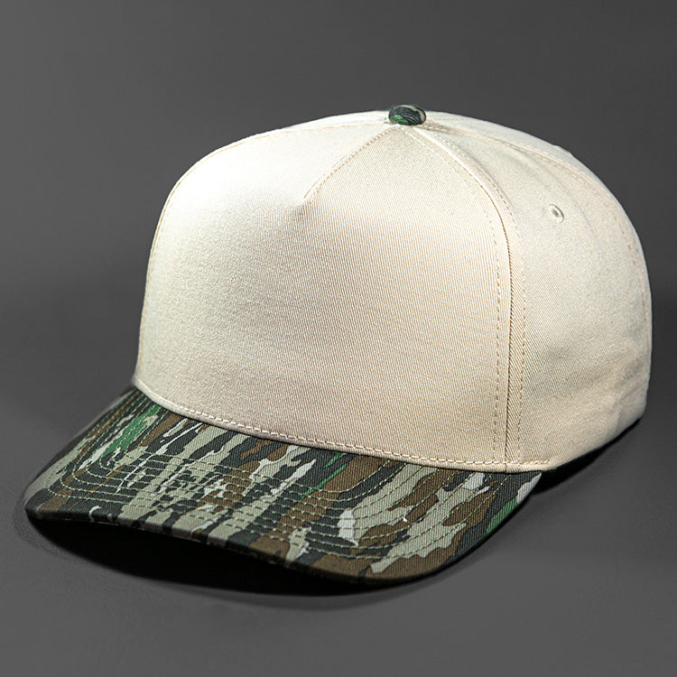 The Blvnk Headwear Origin Vintage Shape Blank Snapback Hat the Natural and Realtree Original Camouflage color way.