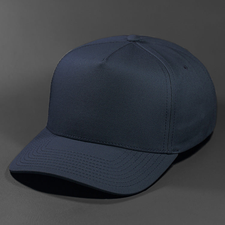 The Blvnk Headwear Origin Vintage Shape Blank Snapback Hat  in the Navy color way.