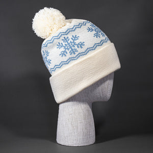 Flakey blank snowflake jacquard pom beanie in Cream and Muted Blue by Blvnk Headwear