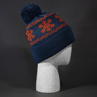 Flakey blank snowflake jacquard pom beanie in Pale Navy and Rust by Blvnk Headwear