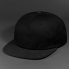 The Rambler blank unstructured corduroy & cotton strap back hat from BLVNK HEADWEAR in Black.