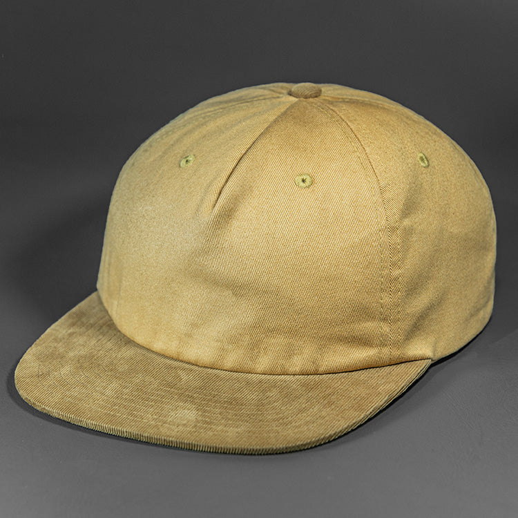 The Rambler blank unstructured corduroy & cotton strap back hat from BLVNK HEADWEAR in Curry and Tan.