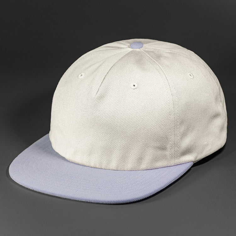 The Rambler blank unstructured corduroy & cotton strap back hat from BLVNK HEADWEAR in Wind Chime and Periwinkle..