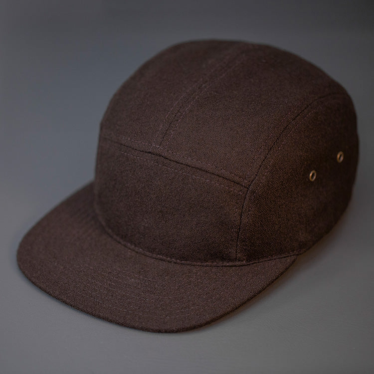 A Warm, Brown, Melton Wool, Blank 5 Panel Camp Hat With a Flat Bill, & Leather Strapback. - Designed by Blvnk Headwear.