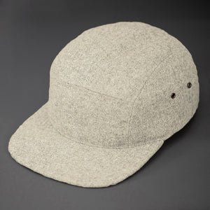 A Warm, Heather Oatmeal, Melton Wool, Blank 5 Panel Camp Hat With a Flat Bill, & Leather Strapback. - Designed by Blvnk Headwear.