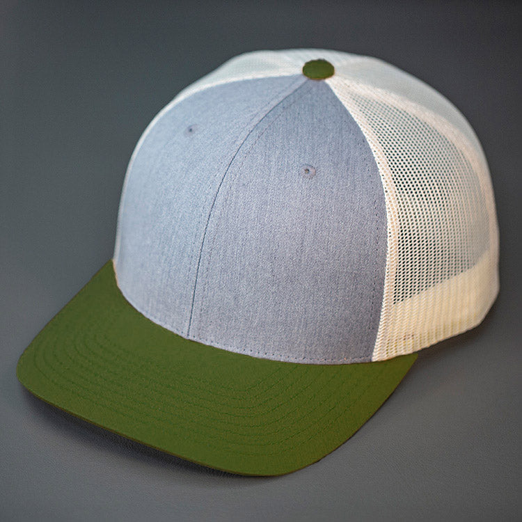 A Heather Grey, Birch & Loden, Cotton Twill, Mesh Backed, Blank Trucker Hat with a Pre Curved Bill, & Classic Snapback. | Designed by Blvnk Headwear