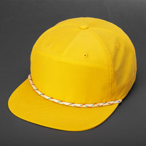 An 80s Yellow, Grandpa Style Nylon, Pinch Front, Blank Flat Bill with a multi color Rope & Classic Snapback. Designed by Blvnk Headwear.