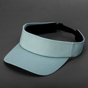 Smoke blue blank visor with strap back by Blvnk Headwear.