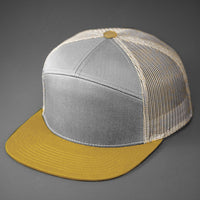 A Heather Grey, Birch & Biscuit colored, Cotton Twill, Mesh Backed Blank 7 Panel Trucker Hat with a Flat Bill, & Classic Snapback. Designed by Blvnk Headwear