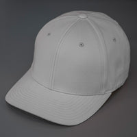 A Pewter, 6 Panel, Blank, Flex Back Twill Crown Hat W/ a Pre Curved Bill.  Designed by Blvnk Headwear.