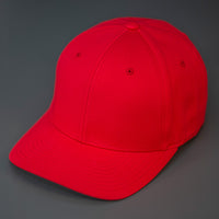 A Red ,6 Panel, Blank, Flex Back Twill Crown Hat W/ a Pre Curved Bill.  Designed by Blvnk Headwear.