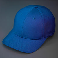 A Royal, 6 Panel, Blank, Flex Back Twill Crown Hat W/ a Pre Curved Bill.  Designed by Blvnk Headwear.