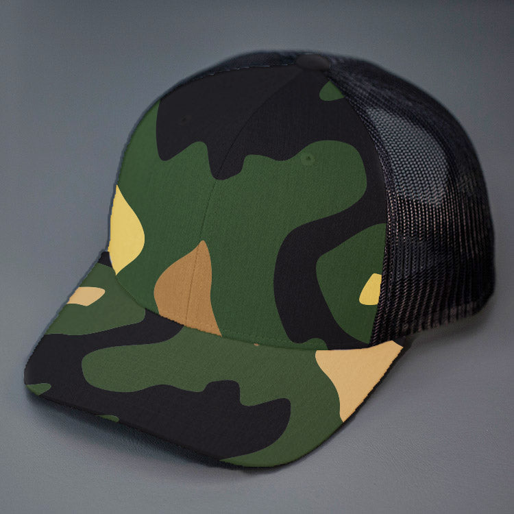 A Camo & Black, Cotton Twill, Mesh Backed, Blank Trucker Hat with a Pre Curved Bill, & Classic Snapback.  |  Designed by Blvnk Headwear