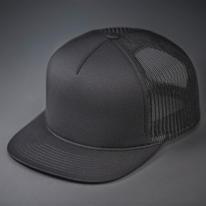 A Charcoal, Foam Front, Mesh Backed Blank Trucker Hat with a Flat Bill, & Classic Snapback.  Designed by Blvnk Headwear.