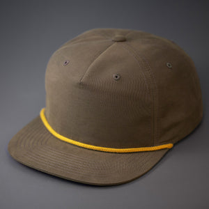 A Loden Color, Grandpa Style Nylon, Pinch Front, Blank Flat Bill with a Gold Rope & Classic Snapback.  Designed by Blvnk Headwear.