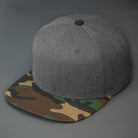 A Heather Charcoal & Camo, Wool, 6 Panel, Flat Bill, Blank Snapback.  Designed by Blvnk Headwear.