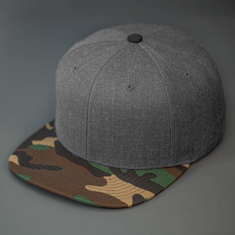 A Heather Charcoal & Camo, Wool, 6 Panel, Flat Bill, Blank Snapback.  Designed by Blvnk Headwear.