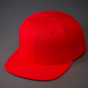 A Red, Wool, 6 Panel, Flat Bill, Blank Snapback.  Designed by Blvnk Headwear.