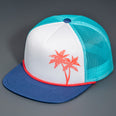 A White & Coral Palm Tree Printed Foam Front, Sea Foam Mesh Backed, Blank Trucker Hats with a Light Navy Flat Bill, & Classic Snapback.  Designed By Blvnk Headwear.