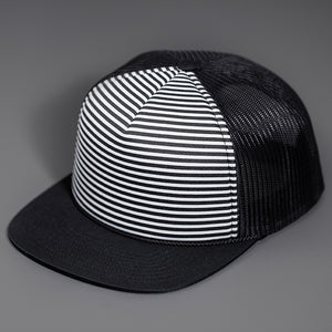 A Black & White Striper Printed Foam Front, Black Mesh Backed, Blank Trucker Hats with a Black Flat Bill, & Classic Snapback.  Designed By Blvnk Headwear.
