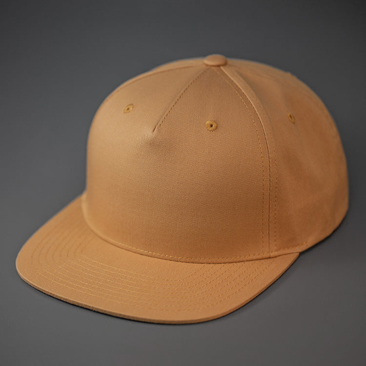 A Biscuit Colored, Cotton Twill, Pinch Front, Blank Snapback Hat.  Designed & Manufactured by Blvnk Headwear.