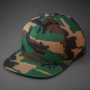 A Camo Colored, Cotton Twill, Pinch Front, Blank Snapback Hat.  Designed & Manufactured by Blvnk Headwear.