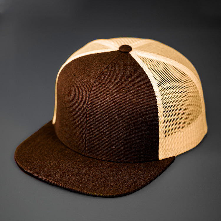 A Brown Wool Crown, Blank Trucker Hat, With Khaki Mesh Back Panels, A Flat Bill & Classic Snapback.  Designed by Blvnk Headwear.